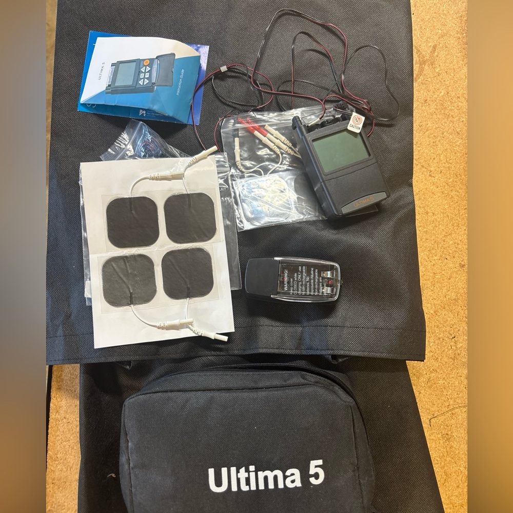 Ultima5 Digital TENS Unit w/ Leads, Extra Electrodes, Manual, Charger like new